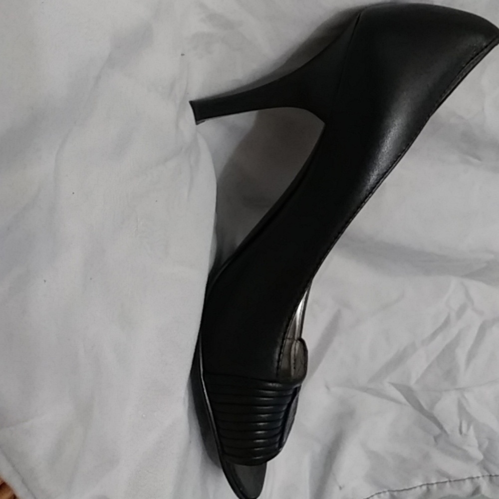 Black Calvin Klein pumps